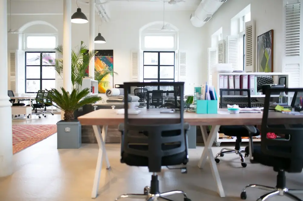 What to look for in an ergonomic office chair - Modern office with chairs and tables