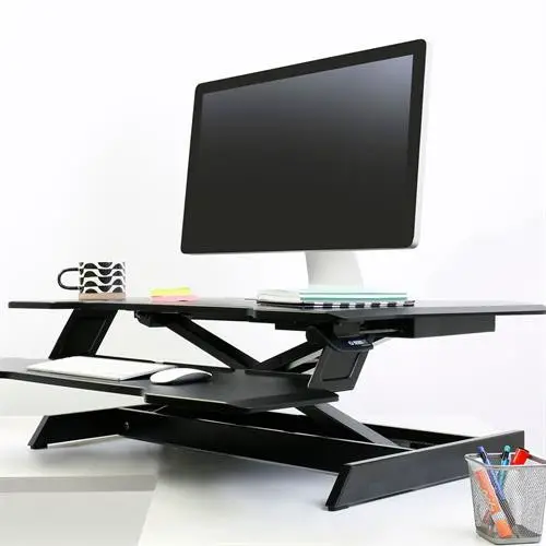Ergotron Workfit corner standing desk converter - at desk with stationary