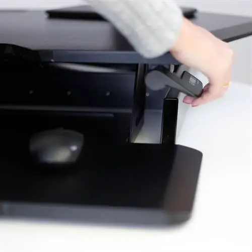 How much weight can a standing desk converter hold? - Ergotron WorkFit Corner Desk Converter handles