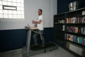 101. How Much Do Treadmill Desks Weigh? Man on desk treadmill