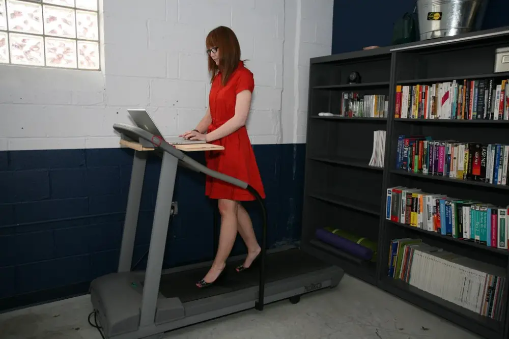 What Size Are Treadmill Desks? - Woman on standing desk treadmill