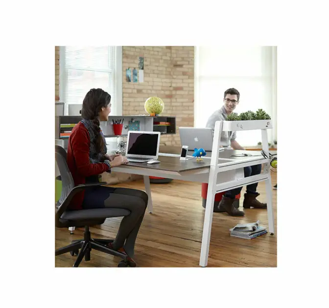 What is a 2 person desk? Bivi Plus 2 double workstation people working in office