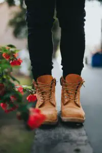 Person wearing Brown boots and black jeans
